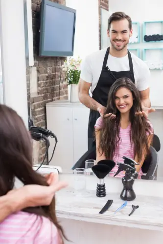 handsome-hair-stylist-with-clien.jpg