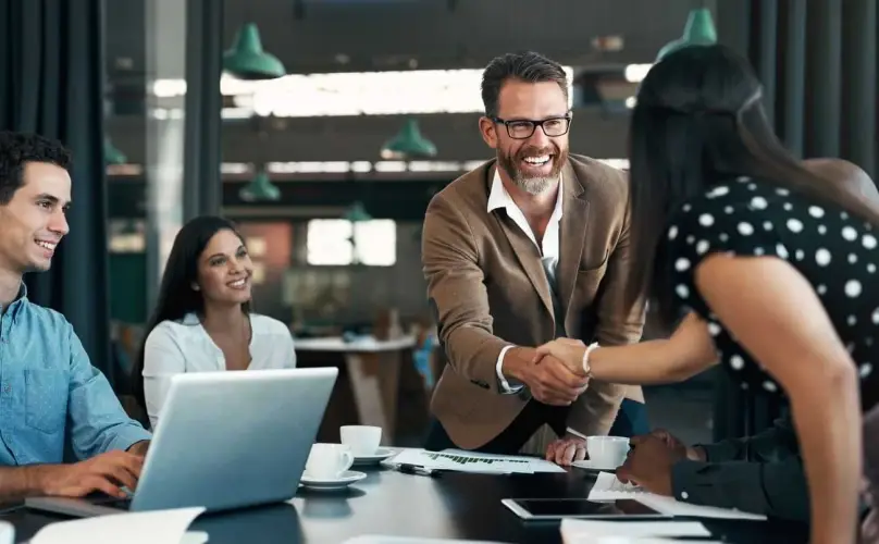 man-shaking-hands-with-woman.jpg