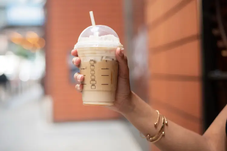 hand-holding-iced-coffee-drink.jpg