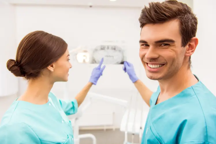 dentist-reviewing-xray.jpg