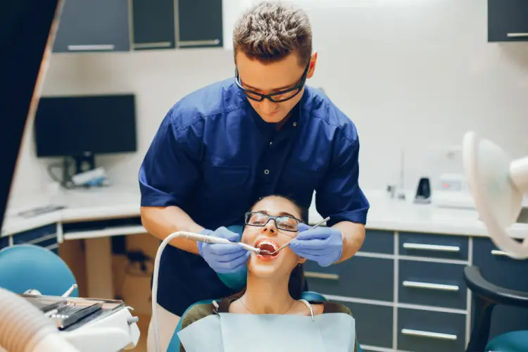 dentist-examining-female-patient.jpg