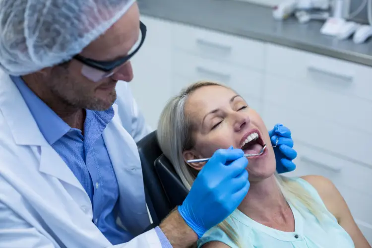 female-patient-dental-exam.jpg