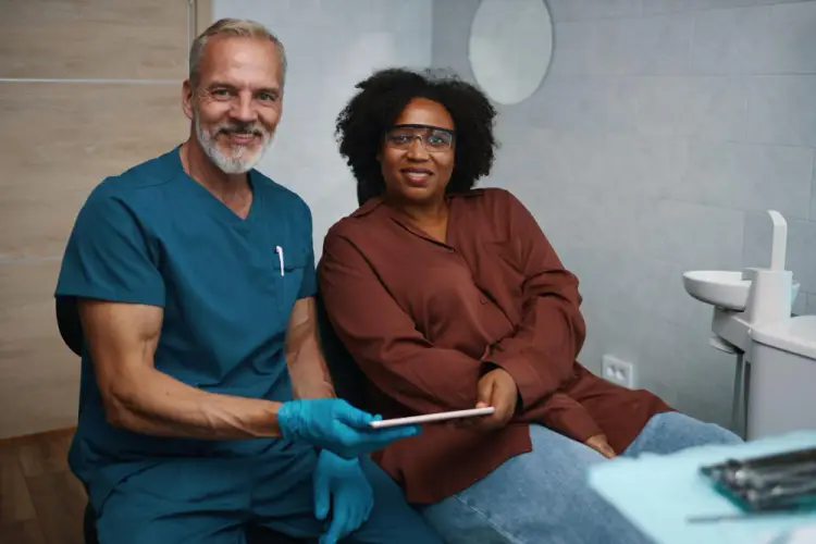 male-dentist-discussing-treatment.jpg