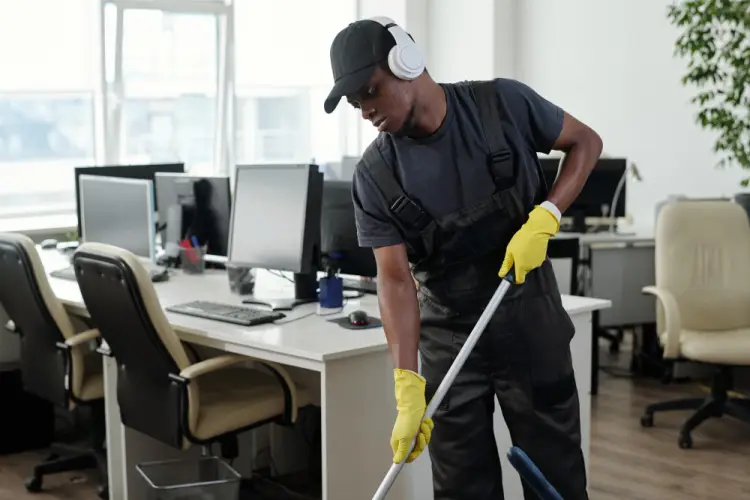 office-janitor-cleaning-workspace.jpg