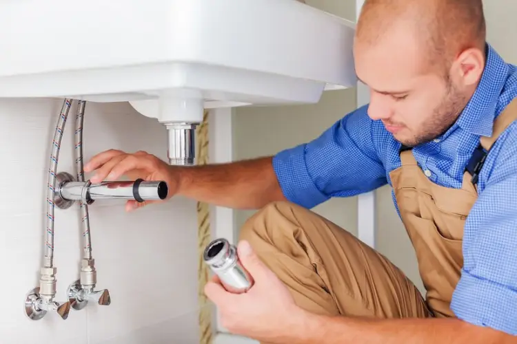 handsome-professional-plumber-fixing-pipes-plumbing-repair-service_488220-7945.jpg