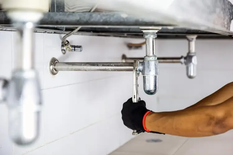 plumber-using-wrench-repair-water-pipe-sink_101448-4981.jpg