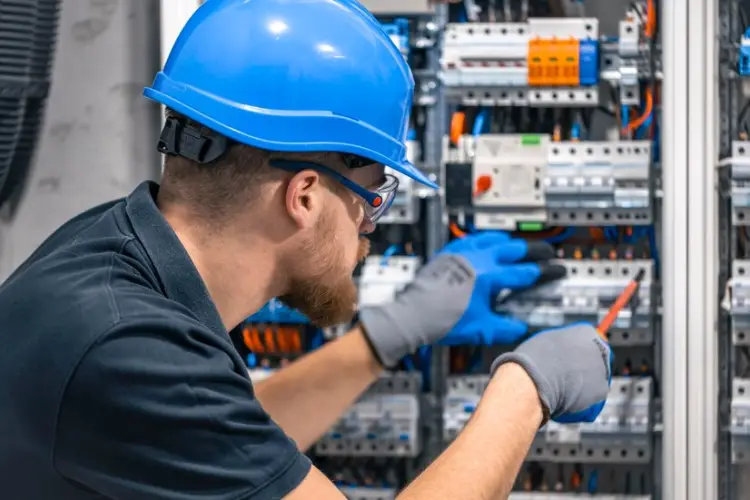 male-electrician-works-switchboard-with-electrical-connecting-cable_169016-52889.jpg