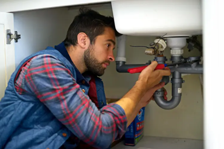 under-sink-pipe-repair-home.jpg