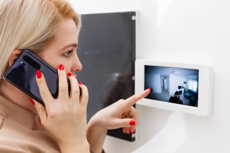 woman-watching-security-camera-monitor.jpg