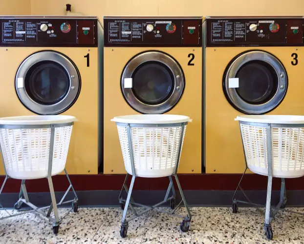 vintage-laundromat-washers-numbered-with-carts.jpg