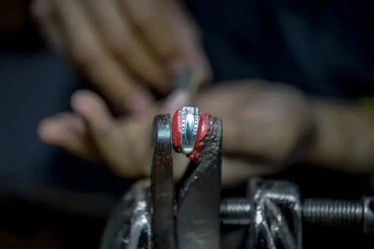ring-adjustment-in-vise-with-precision-tools.jpg