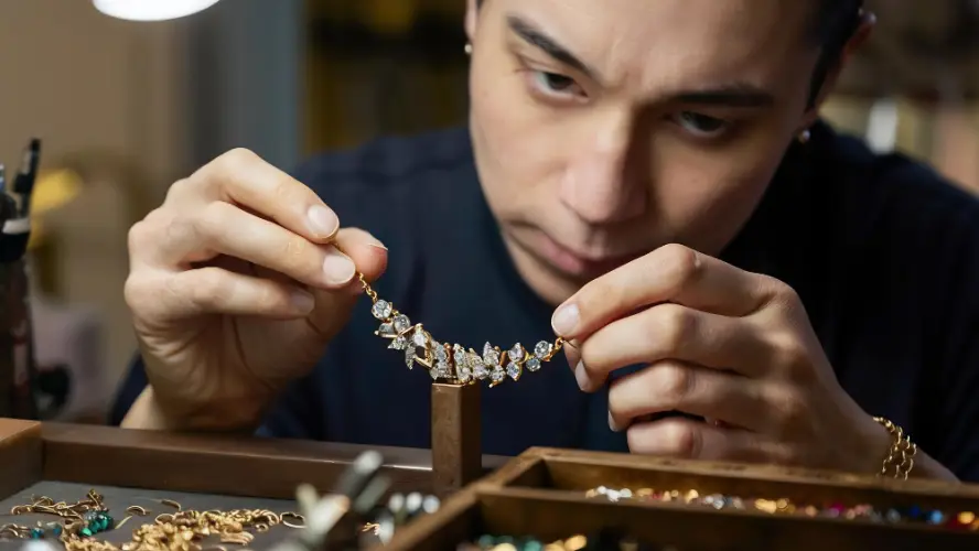 jeweler-examining-diamond-necklace.jpg