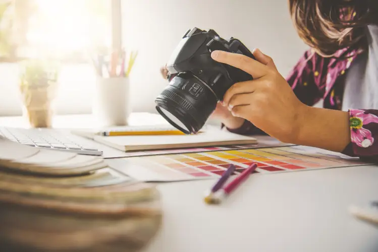 woman-holding-camera-over-color-swatches.jpg