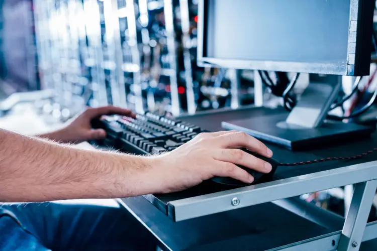 data-center-technician-using-keyboard.jpg