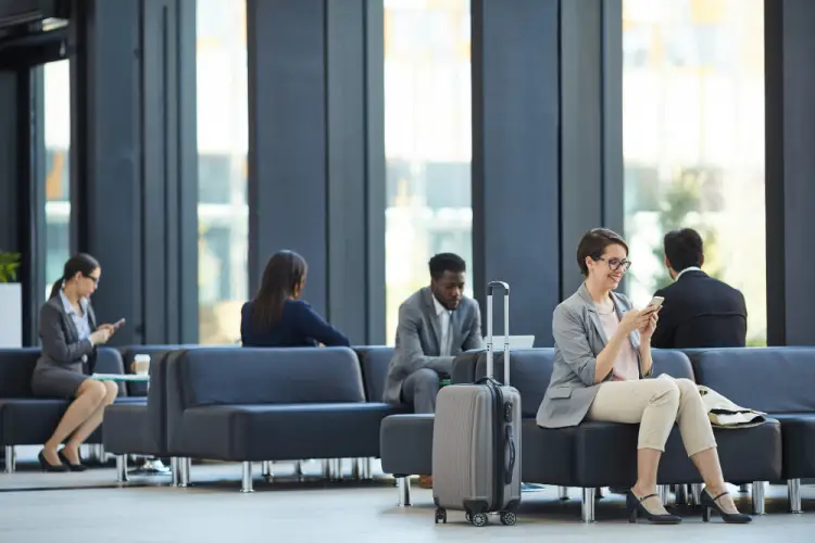 business-travelers-sitting-in-airport-lounge.jpg