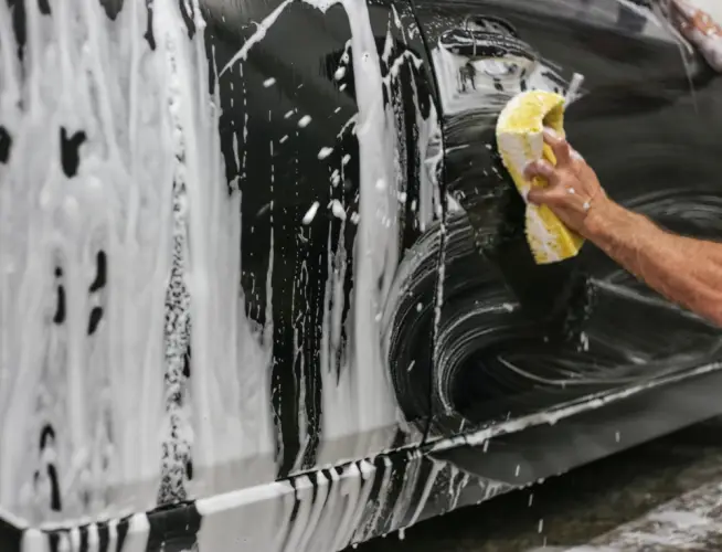 manual-car-wash-sponge-cleaning.jpg