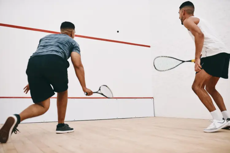men-playing-squash-in-indoor-court.jpg