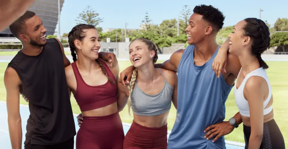 fit-friends-laughing-on-track.jpg