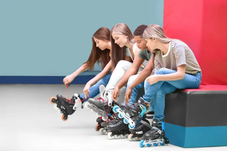 group-teenagers-putting-roller-skates-indoors.jpg