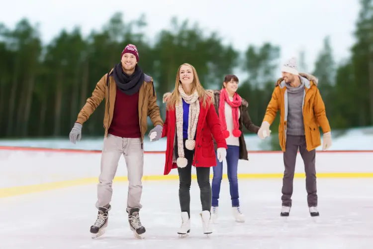 friendship-sport-leisure-concept-happy-friends-holding-hands-skating-rink-outdoor-background.jpg