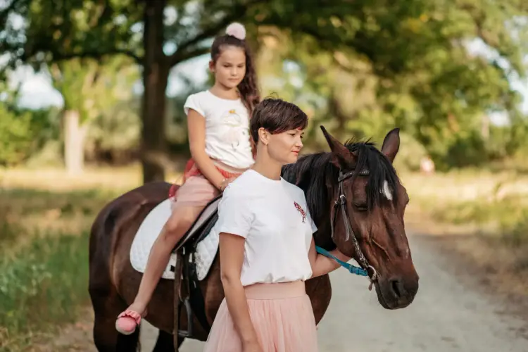 mother-and-daughter-horseback-riding.jpg