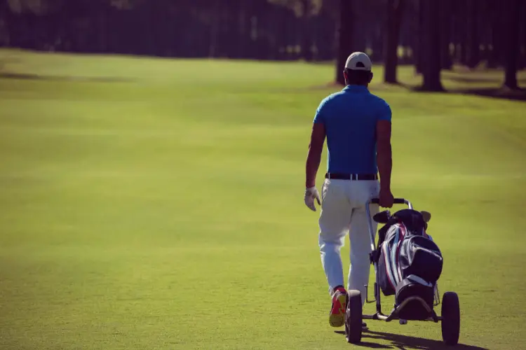 golfer-walking-course-with-bag.jpg