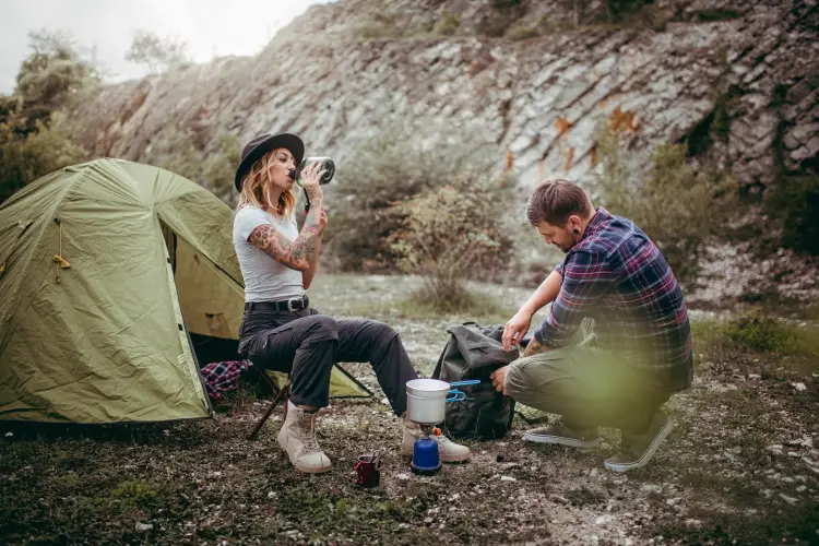 friends-by-tent-preparing-for-camping.jpg