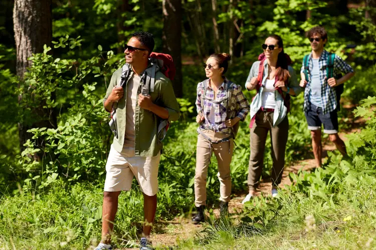 group-friends-with-backpacks-hiking-forest.jpg