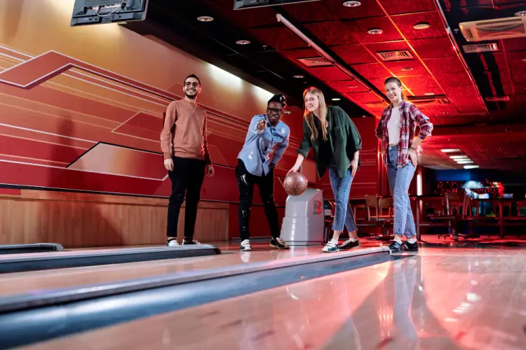 friends-bowling-together-red-lighting.jpg