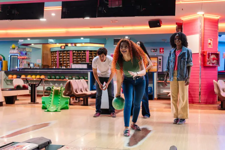 group-playing-bowling-in-bright-alley.jpg