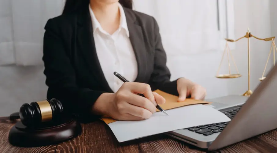 female-lawyer-writing-legal-documents.jpg