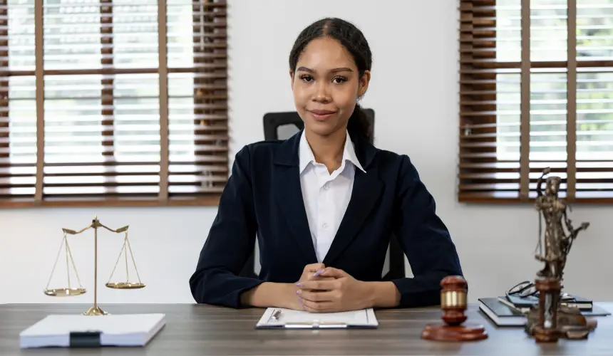 portrait-young-female-lawyer-attorney-working-office-smiling-looking-camera.jpg