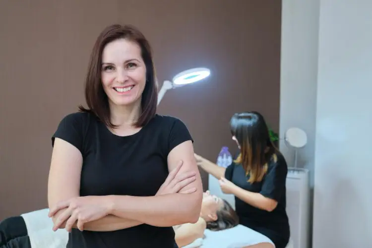 spa-therapist-with-client-in-treatment-room.jpg