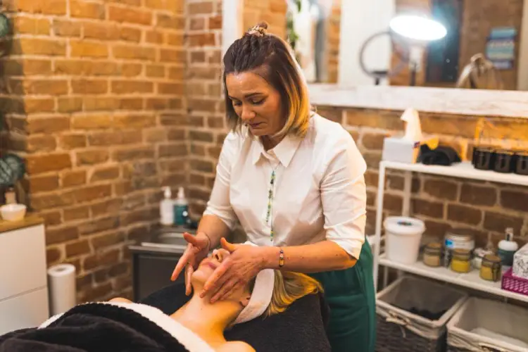 esthetician-giving-facial-massage.jpg