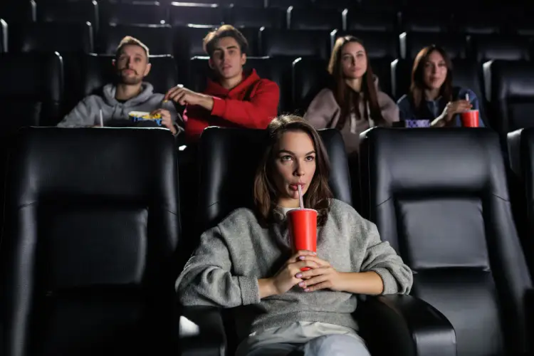 moviegoers-watching-film-recliner-seats.jpg