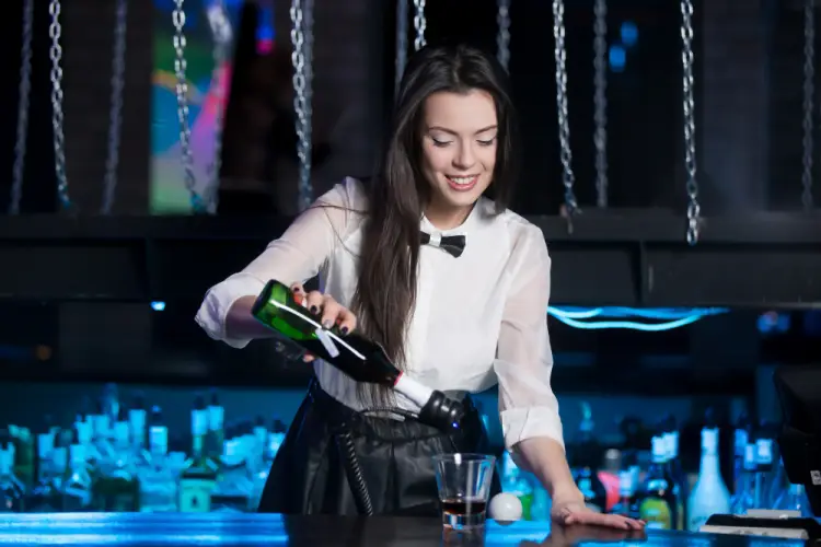 female-bartender-pouring-drink.jpg