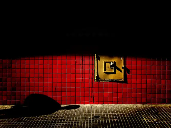 dramatic-red-tiled-wall-with-shadow.jpg