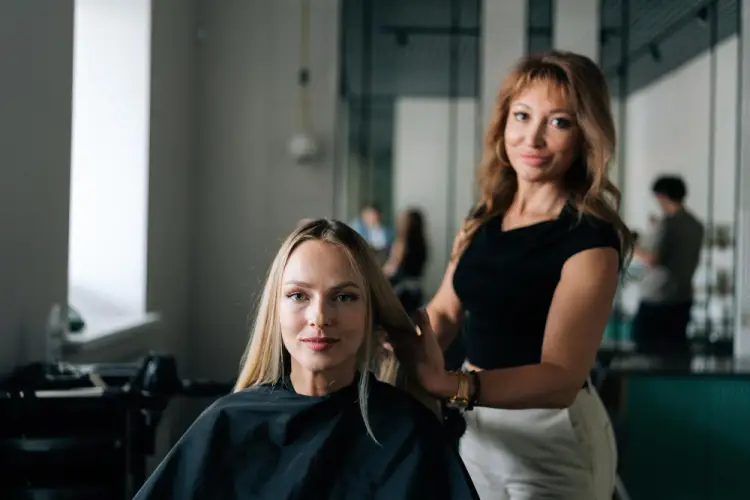 stylist-posing-client-hair-salon.jpg