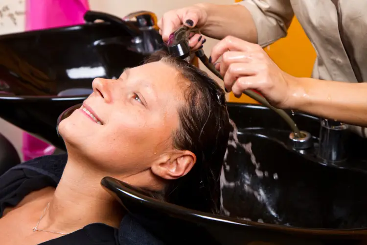 stylist-straightening-hair-salon.jpg