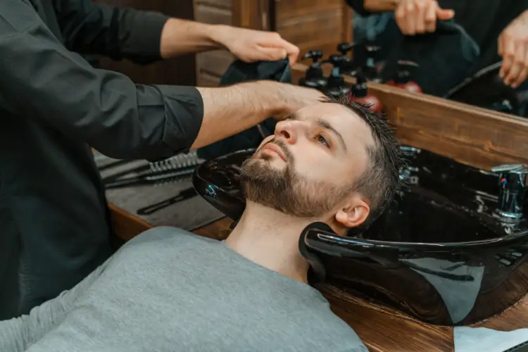 barber-washing-clients-hair-in-salon-sink.jpg