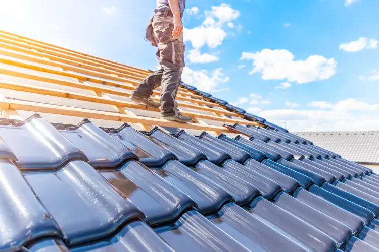 modern-roofing-installation-with-black-tiles.jpg