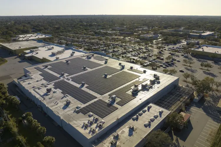 producing-sustainable-energy-electric-photovoltaic-solar-panels-installed-shopping-mall-building-rooftop-production-green-ecological-electricity.jpg