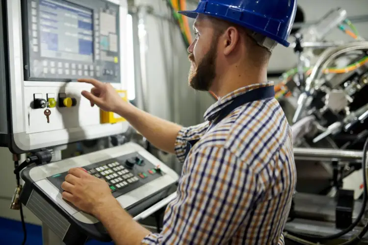 cnc-machine-operator-industrial-controls.jpg