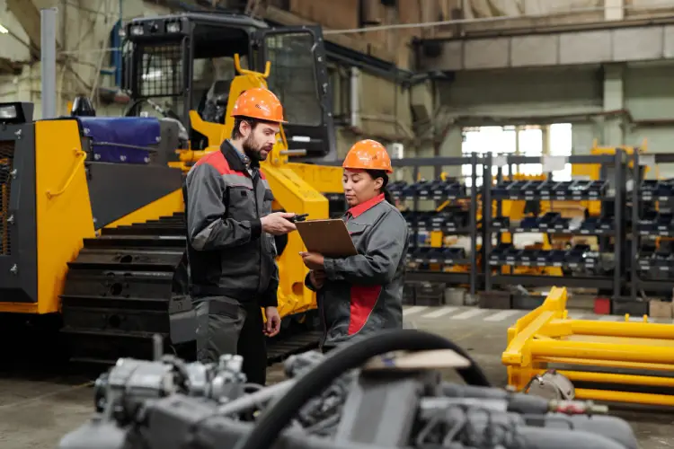 construction-workers-yellow-machine-factory.jpg