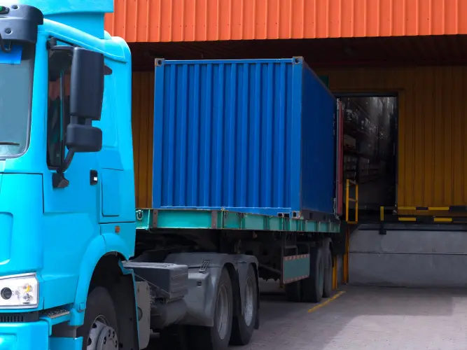 truck-unloading-cargo-at-warehouse.jpg