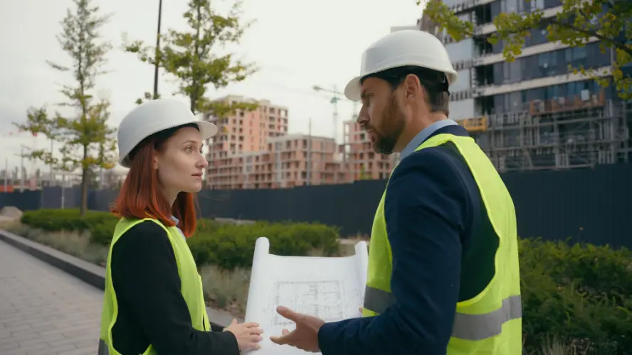 architects-discussing-building-plans.jpg