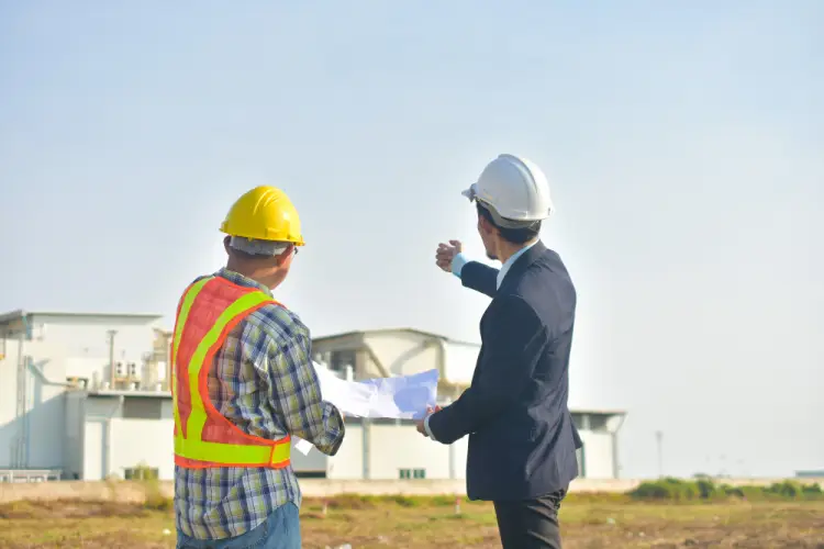 construction-managers-discussing-site-plan.jpg