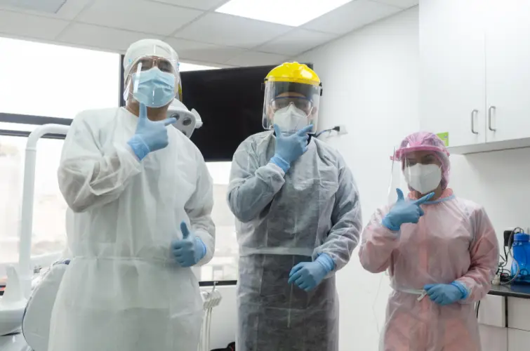 medical-workers-in-ppe-smiling.jpg