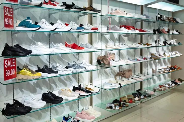 shoe-store-shelves-with-sale-sign.jpg