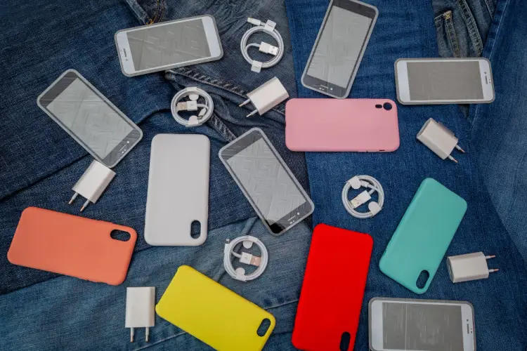 tech-accessories-chargers-and-phones-on-denim.jpg